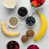 ingredient picture with strawberries, bananas and other red fruit